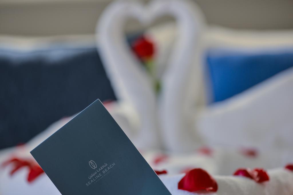 Sealine Beach, A Murwab Resort Mesaieed Ngoại thất bức ảnh A menu at the Waldorf Astoria Ras Al Khaimah